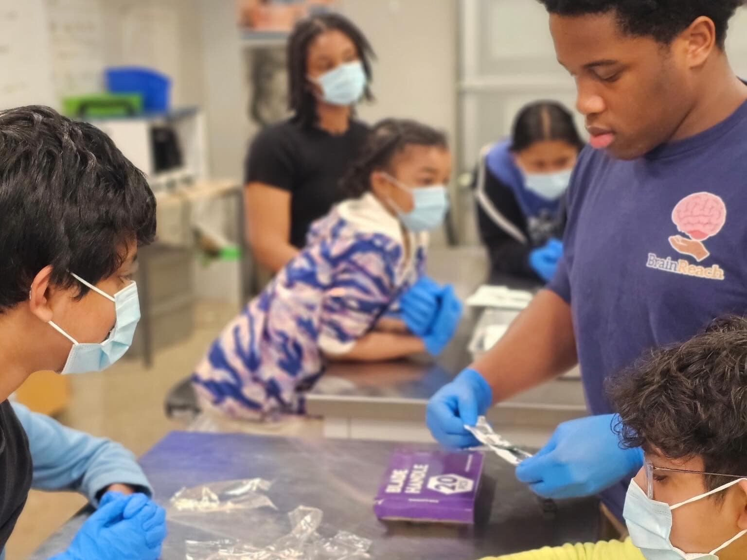 BrainReach instructor guiding students during lab activity